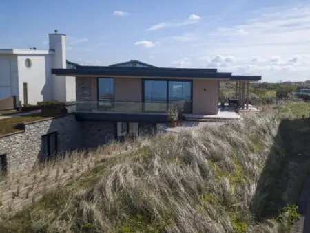 moderno buitengevel bekleding in de duinen | Architect van Manen