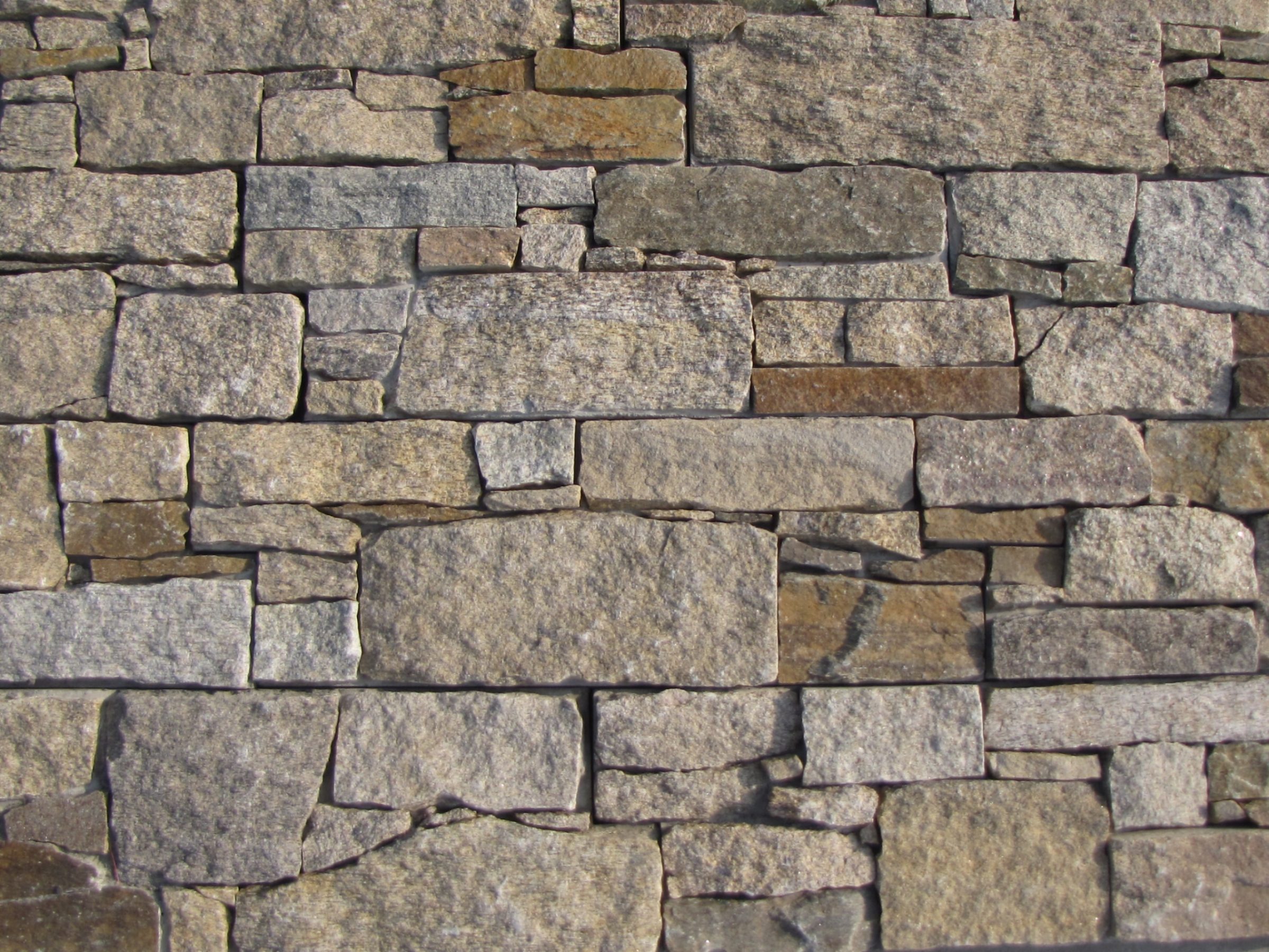 Detailfoto steenpanelen puzzle.
