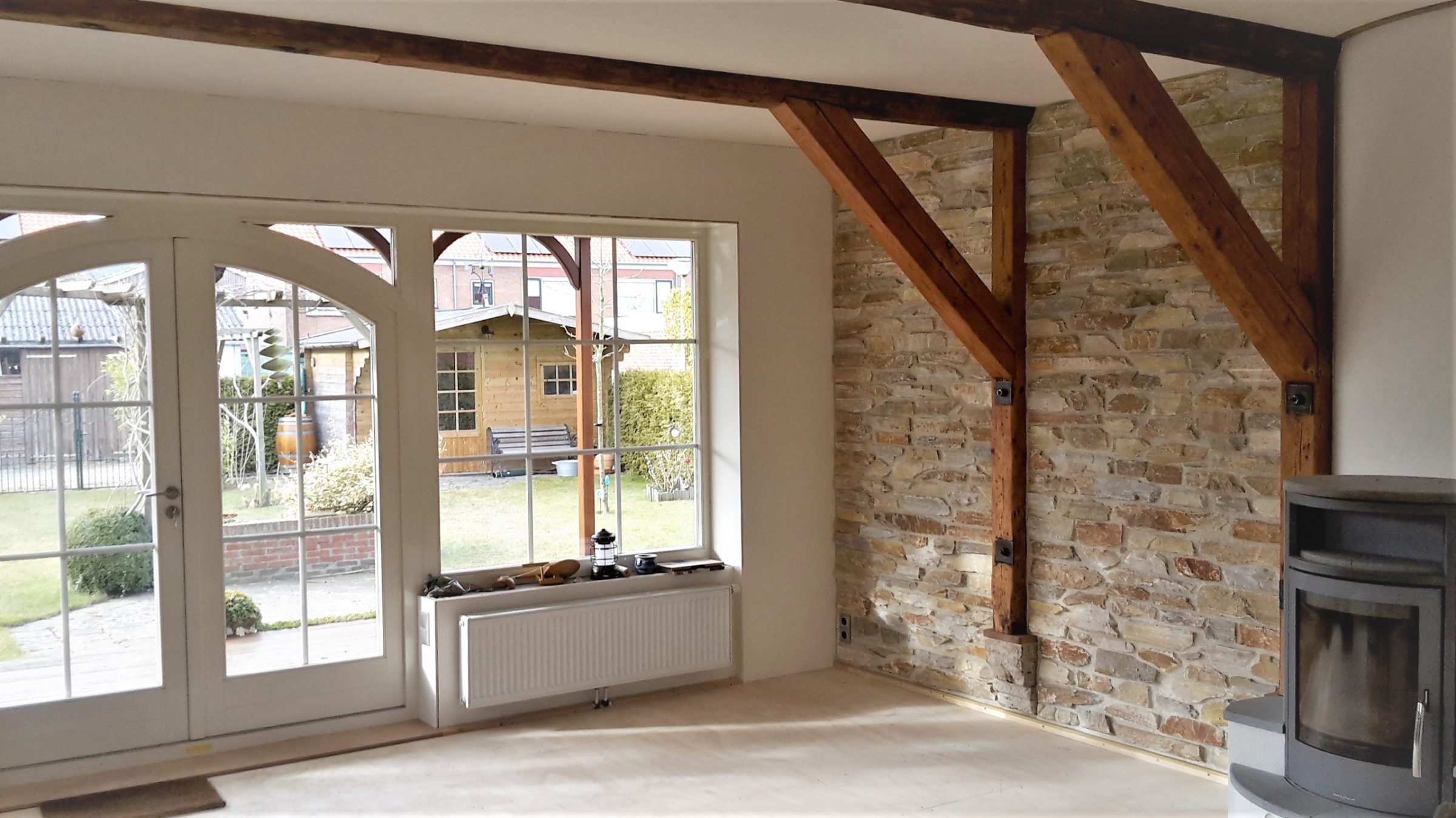 Natuurstenen in de woonkamer - muur.