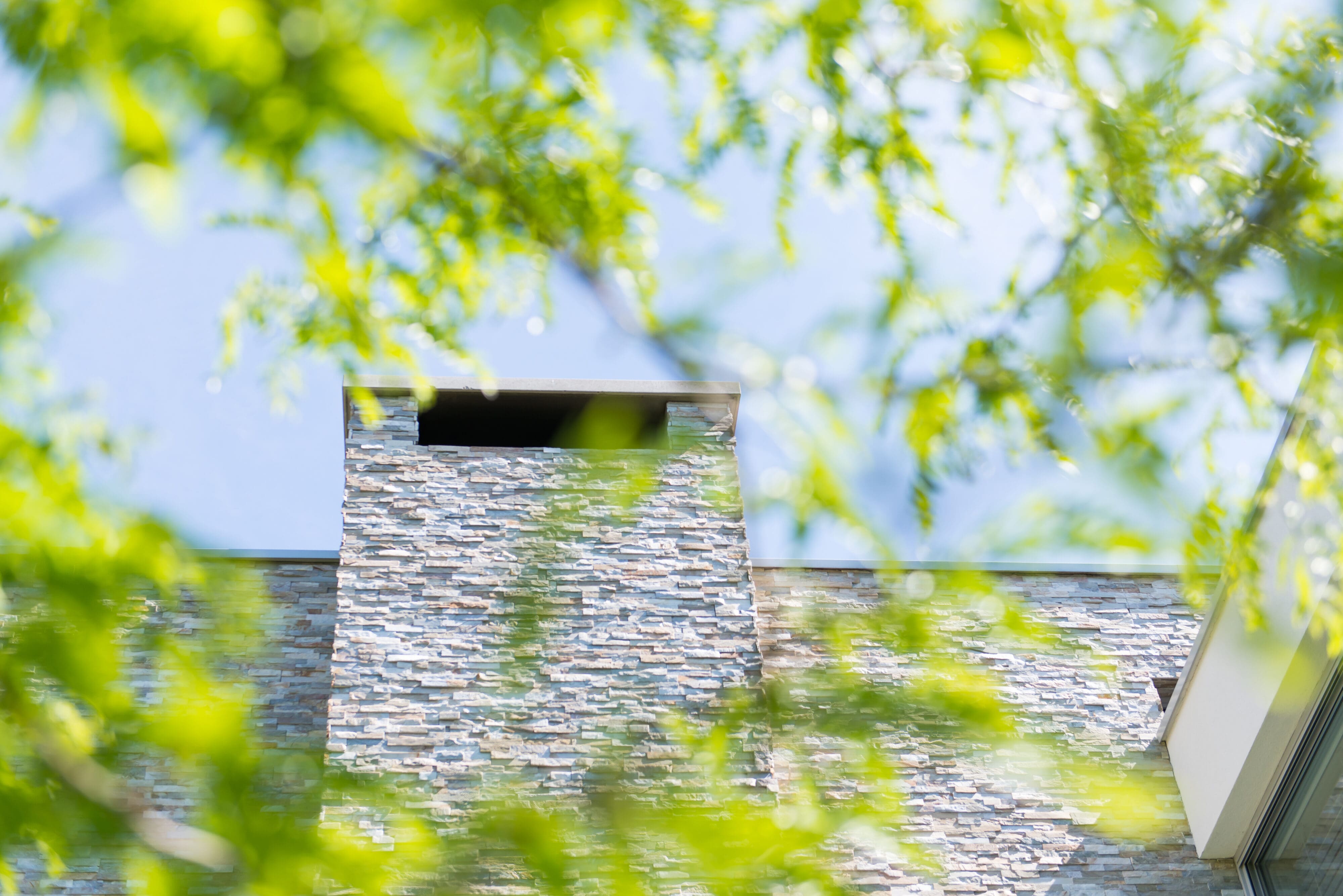 Schoorsteen met Steenstrips | Boxxis Architecten