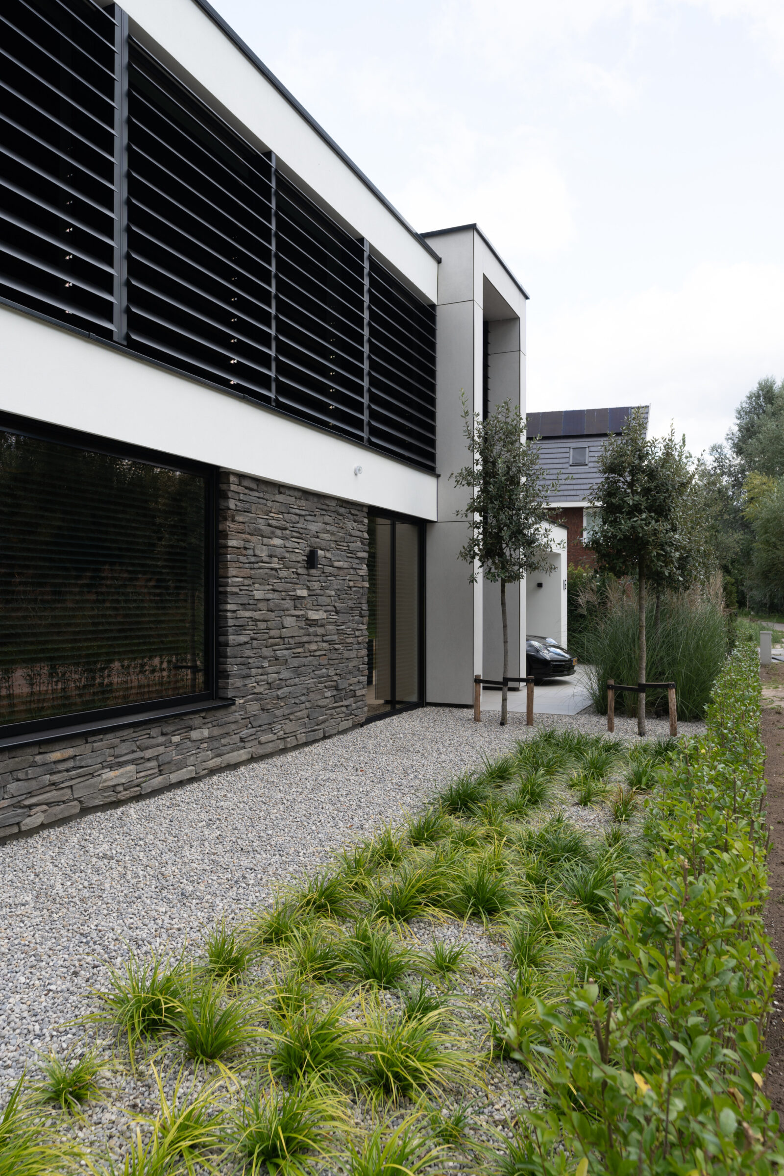 Wand met Natuurstenen uitstraling | Boxxis architecten